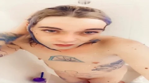 nice-looking beauty in nature's garb Taking A Shower